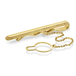 Slipsnål i gull sisselert kant